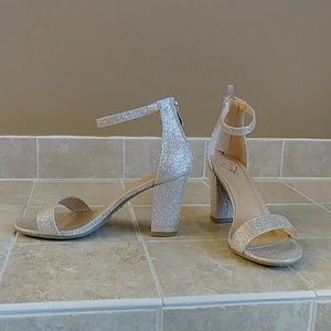 FREE CLUCH WITH PURCHASE OF THESE  SANDALS